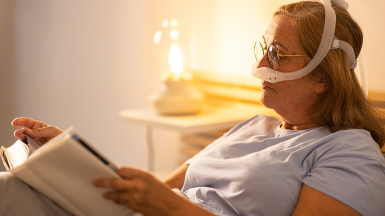 Obstructive sleep apnea in adults - patient reading (female) 2